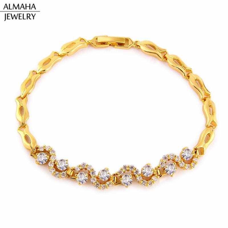 Clear crystals swirls gold plated bracelet