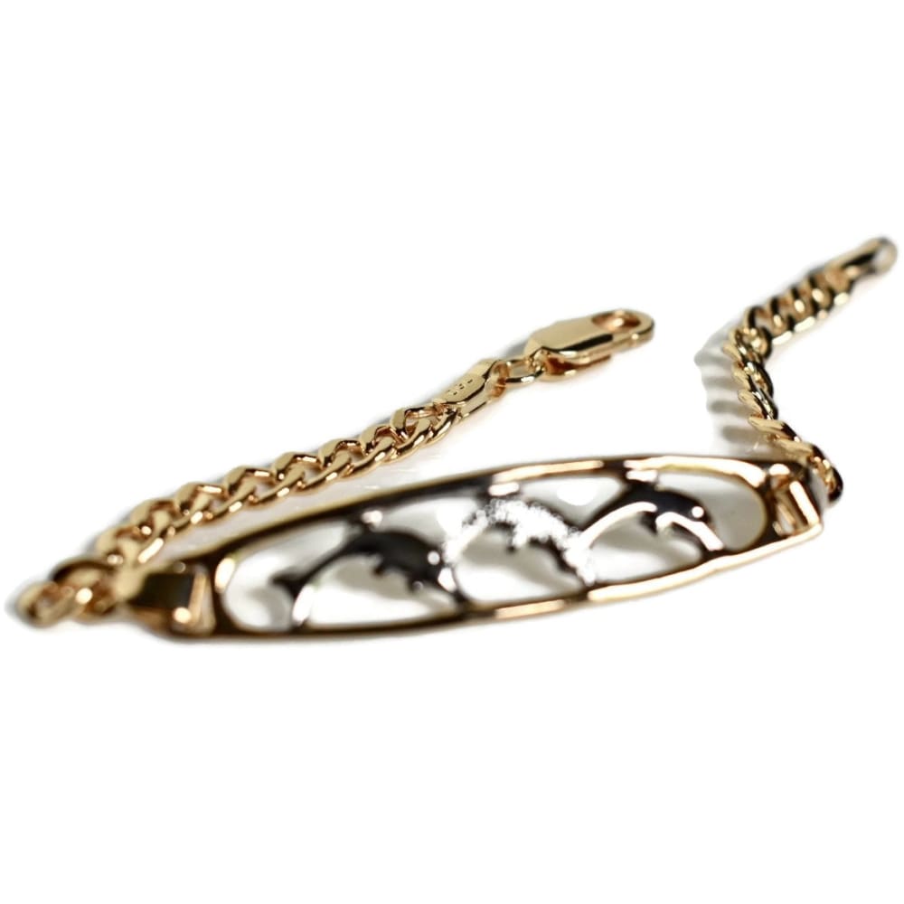 Dolphins curb link bracelet 18kts of gold plated oro lamindo
