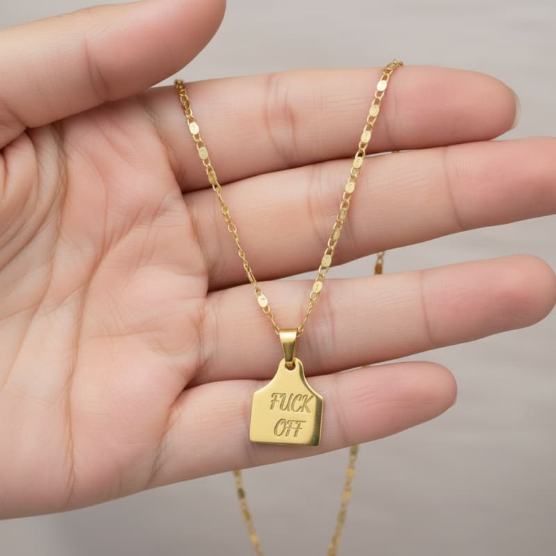 F. Off cow tag gold plated pendant - necklace.