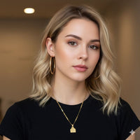 F. Off cow tag gold plated pendant - necklace.