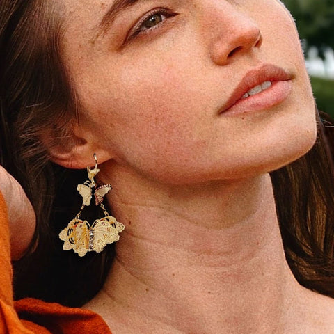 Cz red flower dangle 18kts gold plated earrings
