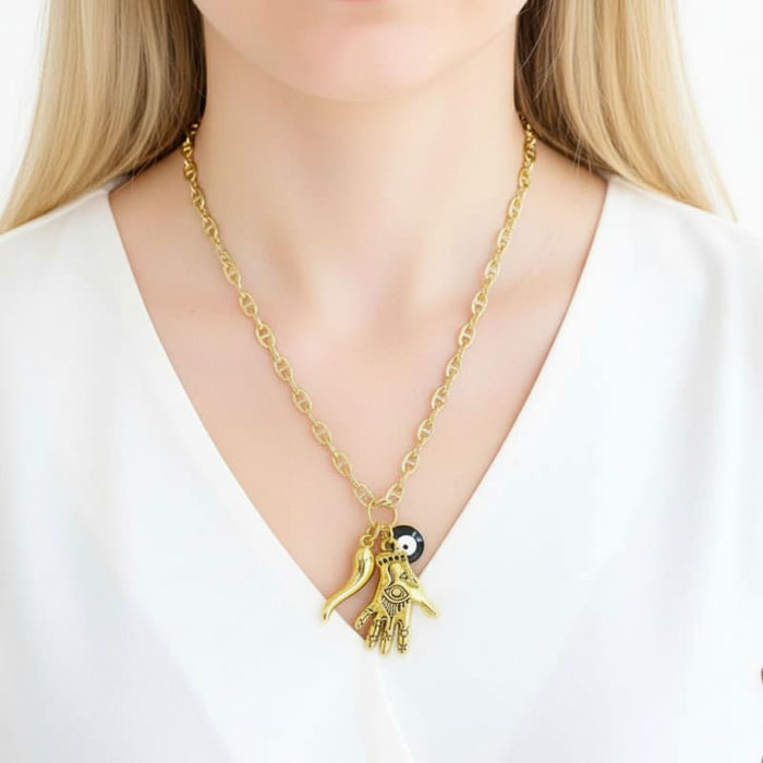 Mística hamsa hand evil eye horn necklace in 14k of gold layered chains