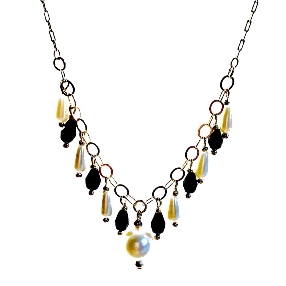 Black and white faux pearls 18kts of gold plated necklace 18” chains