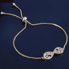 Bow cz 18kts of gold plated bolo bracelet one size / adjustable bracelet
