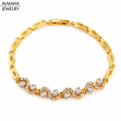 Clear crystals swirls gold plated bracelet bracelets