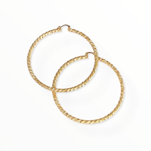 Diamond cut hoop earrings in 18kts of gold plated l