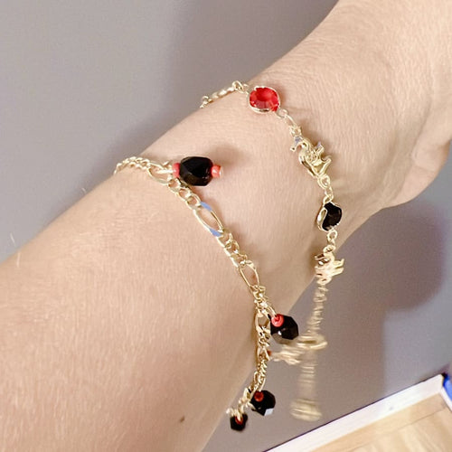 Elephant with red and black flat beads 18kts of gold plated bracelet bracelets