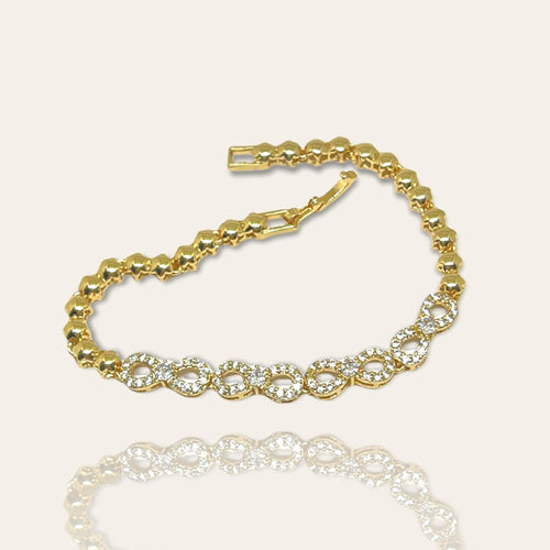 Infinity cz bracelet in 18kts of gold plated 7.5” bracelets