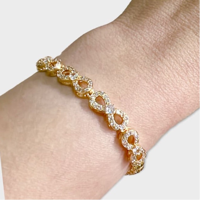 Infinity cz bracelet in 18kts of gold plated 7.5” bracelets