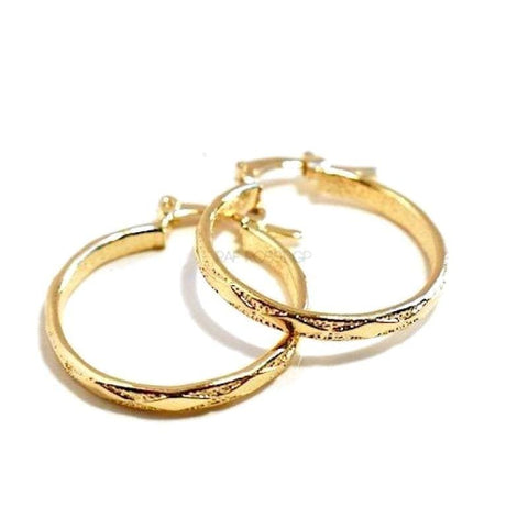 Flor hoop earrings in 18kts of gold plated